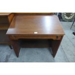 A teak writing desk