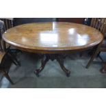 A Victorian inlaid walnut oval tilt top loo table