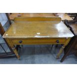 A Victorian scumbled pine single drawer side table