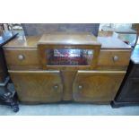 A walnut cocktail sideboard