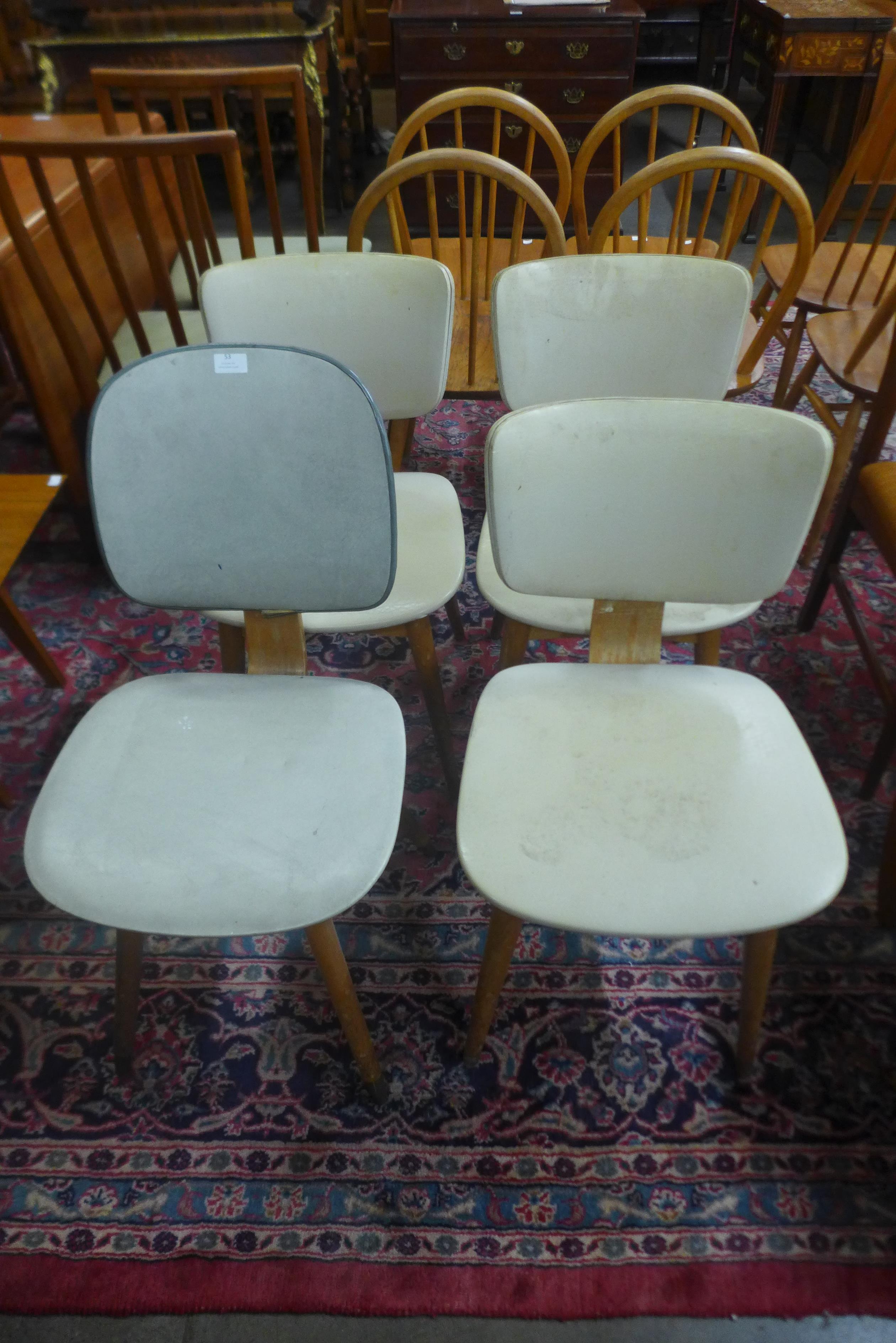 A set of three bent plywood and vinyl kitchen chairs and another similar