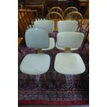 A set of three bent plywood and vinyl kitchen chairs and another similar