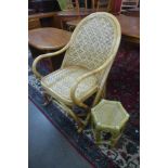 A bamboo and rattan chair and occasional table