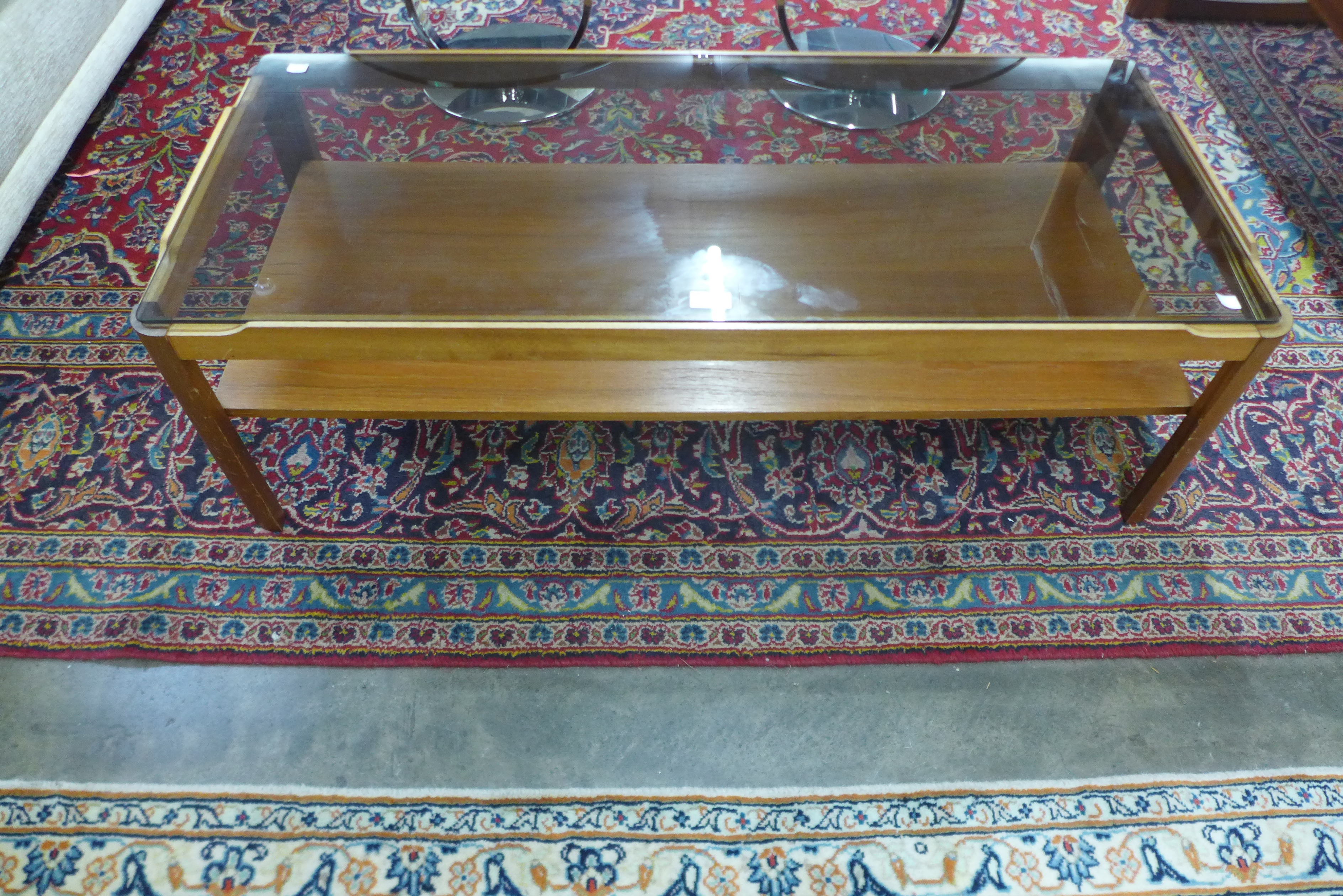 A Myer teak and glass topped coffee table