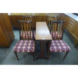 A G-Plan Fresco teak drop leaf table and four chairs
