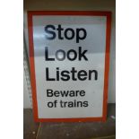 An enamelled railway pedestrian level crossing sign