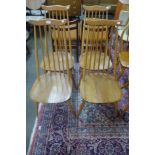 A set of four Ercol Blonde elm and beech Goldsmith chairs