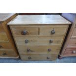 A Victorian waxed pine chest of drawers