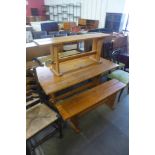 A pine refectory table and two benches