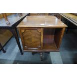 A mahogany revolving bookcase