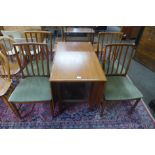 A teak drop leaf dining table and four McIntosh dining chairs