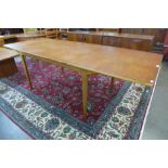 A McIntosh teak T-3 teak extending dining table