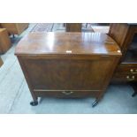 A walnut metamorphic cocktail drinks cabinet