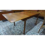 A White & Newton teak extending dining table