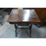 A Victorian inlaid walnut lady's sewing table