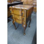 A small walnut drop leaf chest of drawers