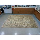 A Persian cream ground Kashan rug, 399 x 284cms