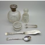 A silver topped glass scent bottle, hinge a/f, a late Victorian silver mounted scent bottle, a