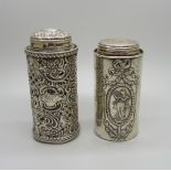 Two silver topped glass bottles including one Victorian, both in hallmarked silver holders,