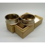 A pair of silver napkin rings, boxed, 22g