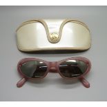 A pair of vintage Ray Ban sunglasses, with case