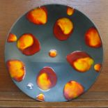 A Poole Galaxy dish, with tag, 25cm