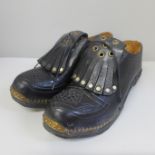 A pair of size 4 dancing clogs