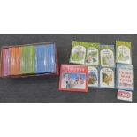 A collection of 55 Ladybird Puddle Lane books, six with names written in, including picture word