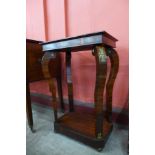 A small Victorian mahogany and brass mounted console table