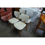 A set of three bent plywood and vinyl kitchen chairs and another similar