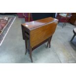 An Edward VII inlaid mahogany Sutherland table