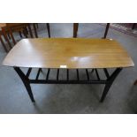 A Nathan teak and black coffee table