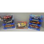 Seven slot car vehicles, five Scalextric, Revell and Ninco