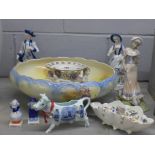 A wash bowl, a pair of Leonardo figures, one other figure, a centrepiece, a/f, a novelty salt and