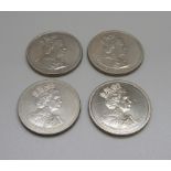 Four 2002 £5 coins