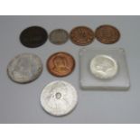 An 1813 one penny token, a US 1964 half-dollar, a 1902 commemorative, etc.