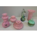 Seven items of Maltese glass: three pink mottled vases, a marbled globe vase and a seahorse