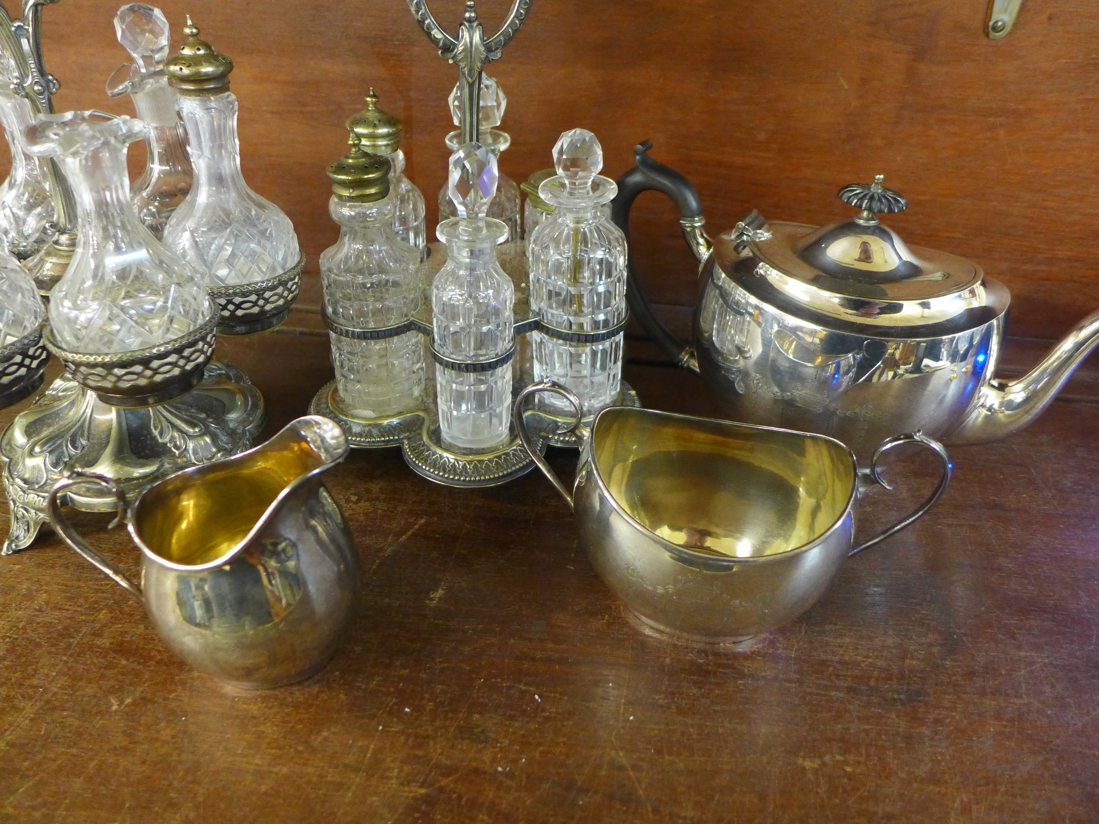 Two six-bottle cruets with plated stands and a silver plated three piece tea service - Image 2 of 3