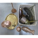 A collection of metalware including copper moulds, a funnel, a jug, a tray, etc. **PLEASE NOTE