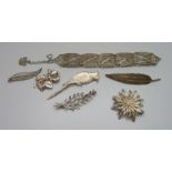 Six brooches and a filigree bracelet