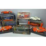 A collection of model cars including Burago and Maisto, some boxed and an Airfix kit