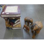 Three carved wooden elephants and a side table/stool in the form of a cat climbing on books **PLEASE