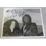 A James Brown autographed press photograph