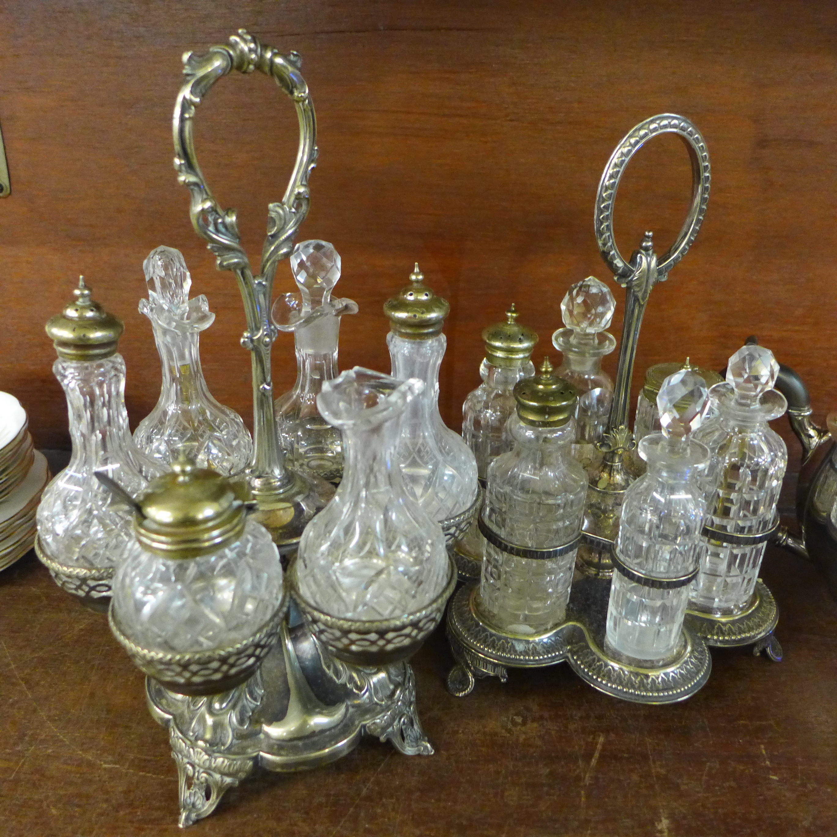 Two six-bottle cruets with plated stands and a silver plated three piece tea service - Image 3 of 3