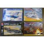 Four model kits comprising two helicopters and two aircraft, Revell, Ertl and Italeri