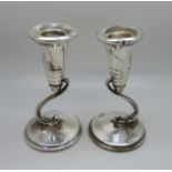 A pair of silver candlesticks, Birmingham 1957, 12.5cm