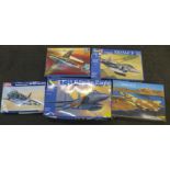 Five model aeroplane kits including Revell, Keller, Italeri and Monogram, some with after market