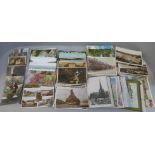 A box of approximately 130 Edwardian and later photographic postcards