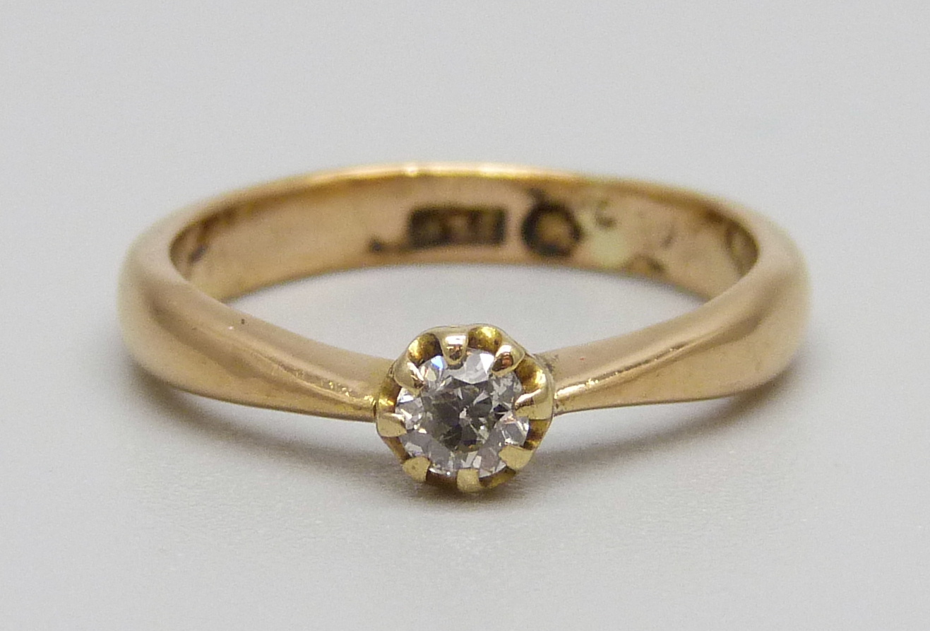 A 22ct gold and diamond solitaire ring, 3.6g, J