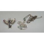 A silver and enamel pendant and chain and a silver bug brooch
